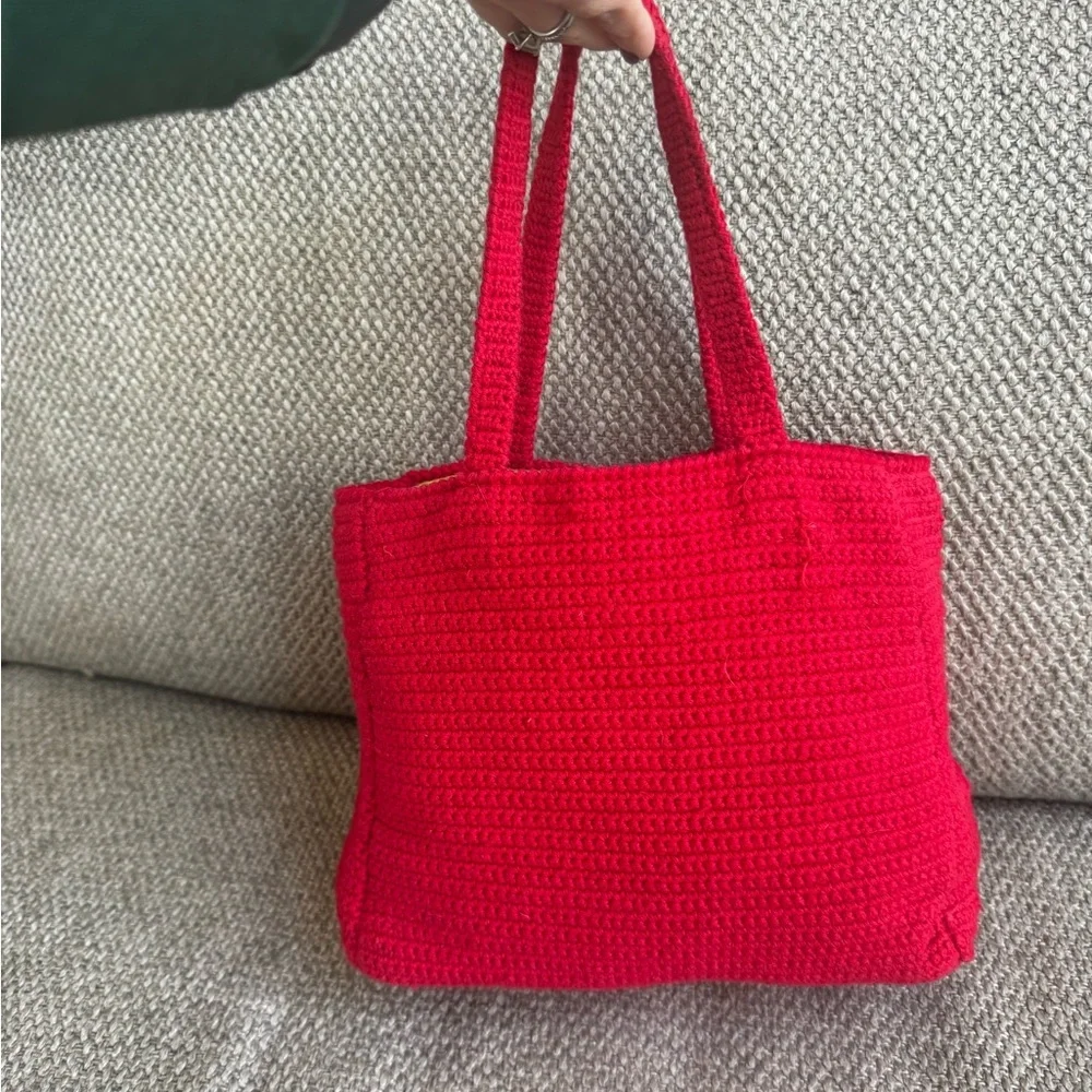 Michael Simon Red knit women’s tote with felt and embroidered people